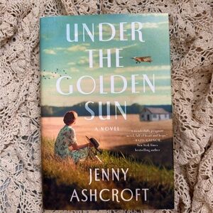 Under the Golden Sun Hardcover Book